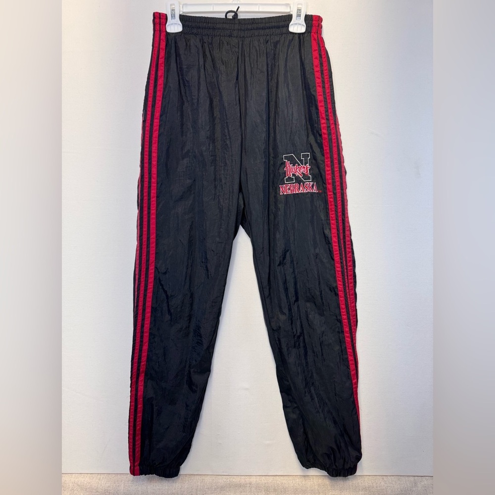 Nebraska Huskers vintage men’s track pants size Medium black red lined Adidas‎